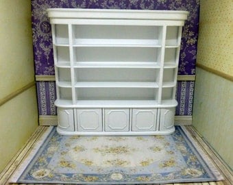 Store cabinet lacquered in white, made of carved wood. Bespaq style.