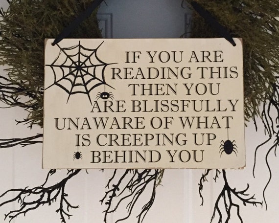 Halloween Sign Creeping Up Behind You