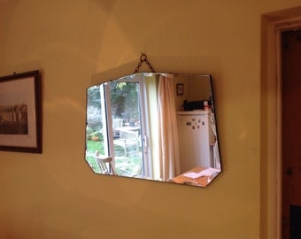 A stunning large vintage Art Deco wall mirror with scalloped bevelled edges. 1930's/40's