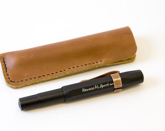 Leather Pen Case. Leather slip case in brown oil tanned leather. To fit Kaweco Sport or full size fountain pen.
