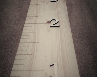 Unfinished Wood Growth Chart and oversized ruler. Use to measure your child's height. 8 inches wide