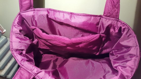 purple quilted handbag