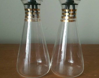 Vintage Pyrex Salt and Pepper shakers.