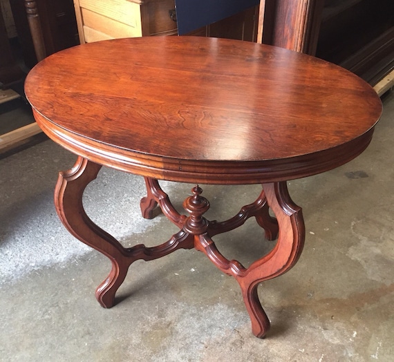 Antique Oval Cherry Parlor Table Curved Legs Center Spire
