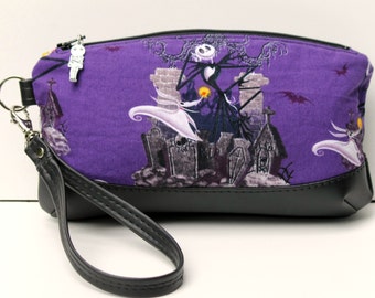 Clematis Clutch with wrist strap, done in Nightmare Before Christmas fabric Jack Skellington pouch