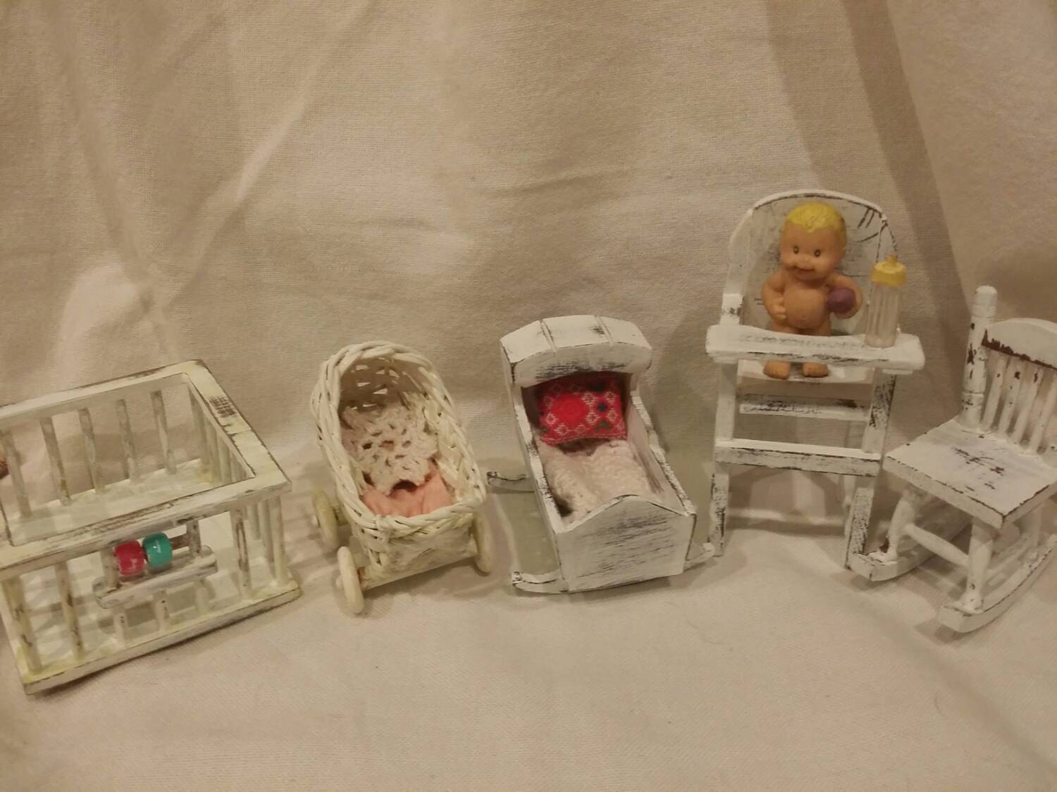 Miniature baby items. Miniature baby crib. Miniature baby.