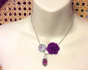 Up cycled necklace made be me. Recycled old earrings.