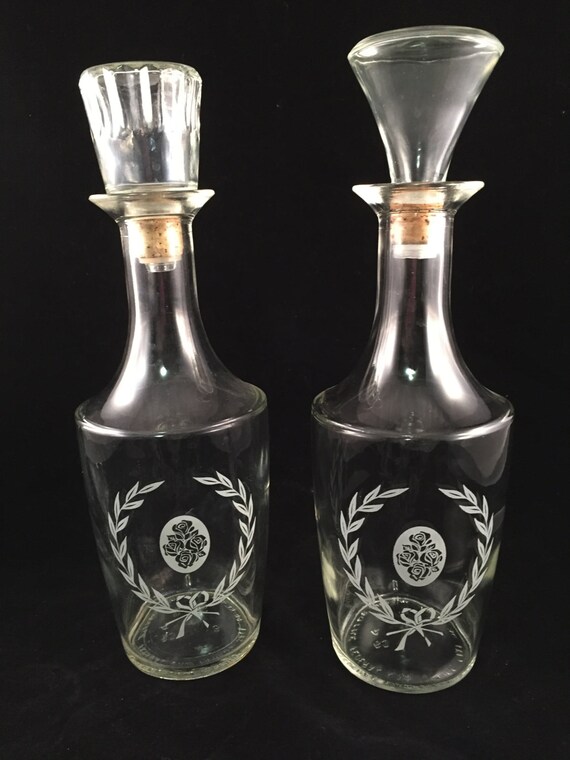 Set of 2 Glass Liquor Decanters with Matching Emblems Cork