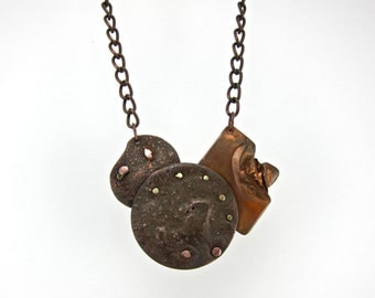 mixed metal, rustic statement necklace, discs, rivets