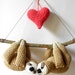 sloth with heart stuffed animal