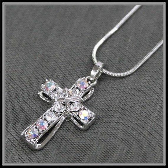 Items similar to Tiny Sparkle Cross on Etsy