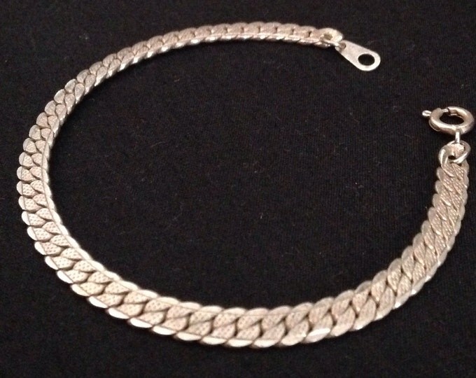 Storewide 25% Off SALE Vintage Silver Tone Elegantly Interlocked Designer Bracelet Featuring Raised Design Style Accent