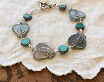 Saints and Hearts vintage assemblage bracelet turquoise bracelet found object jewelry