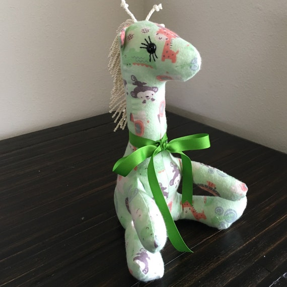 green giraffe plush