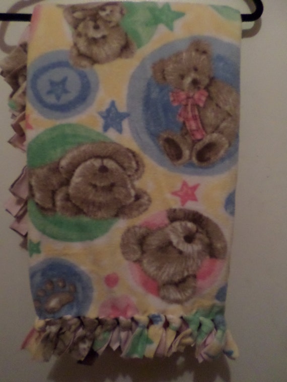 Teddy Bear No Sew Fleece Tie Blanket With Light Pink Backing.