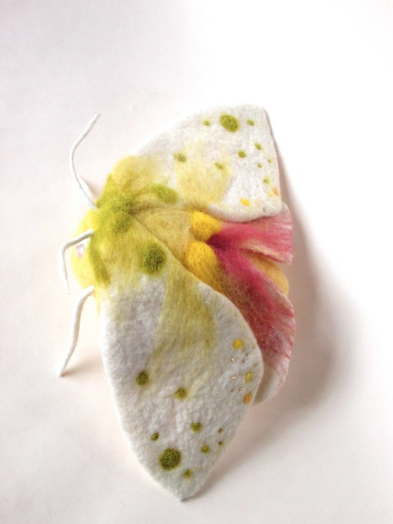 Butterfly with a human face soft sculpture moth