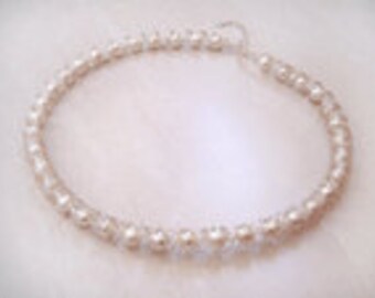 Items similar to Pearl spiral necklace on Etsy