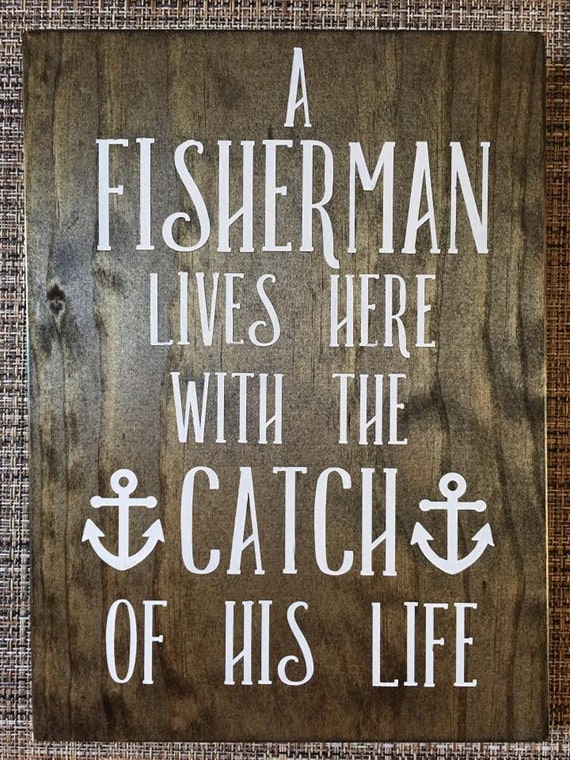 A Fisherman Lives Here With The Catch Of His Life Wooden Sign