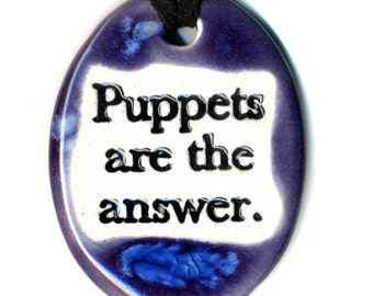 Puppets Are The Answer Ceramic Necklace in Purple
