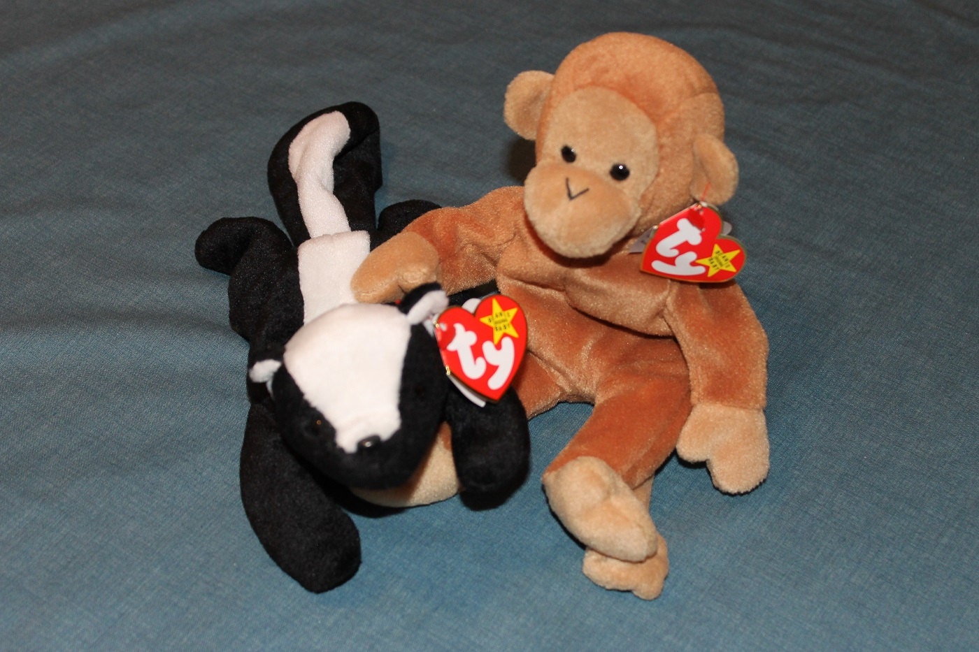 Ty Beanie Babies Bongo and Stinkey monkey and skunk 1995