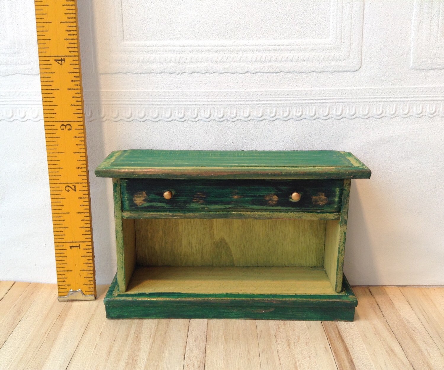 Dark green/gilt/ stained carved bookcase or table