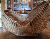 Woven reed clam shell basket Woven reed clam shell basket