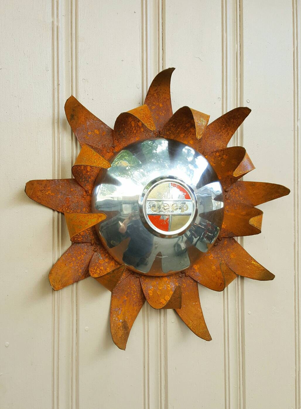 Jeep hubcap sunflower or sun rusted metal wall by MyRustedRoots