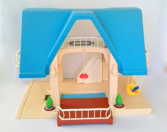 little tikes playhouse blue roof