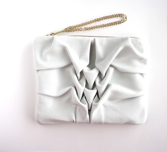 white wristlet clutch bag