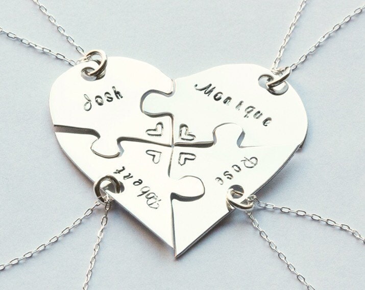 Hand engraved heart puzzle necklaces shaped by InspiredByBronx