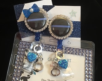 Thin Blue Line nursing badge reel, police gift, policeman,corrections officer,love of duty, handcuff charms ER male RN gift, heart bow bling