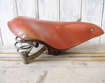 old bicycle saddle leather seat