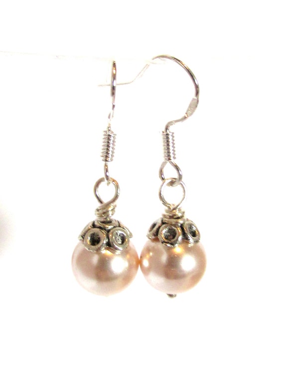 Items similar to Off-white glass pearls earrings for girls, pierced or ...