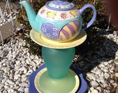 Glass garden art, yard art garden decor, ceramic garden art, whimsical garden sculpture, teapot whimsy, Easter whimsy, teapot birdfeeder Glass garden art, yard art garden decor, ceramic garden art, whimsical garden sculpture, teapot whimsy, Easter whimsy, teapot birdfeeder