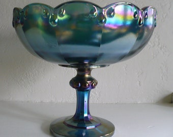 Vintage blue carnival glass pedestal bowl with scalloped rim