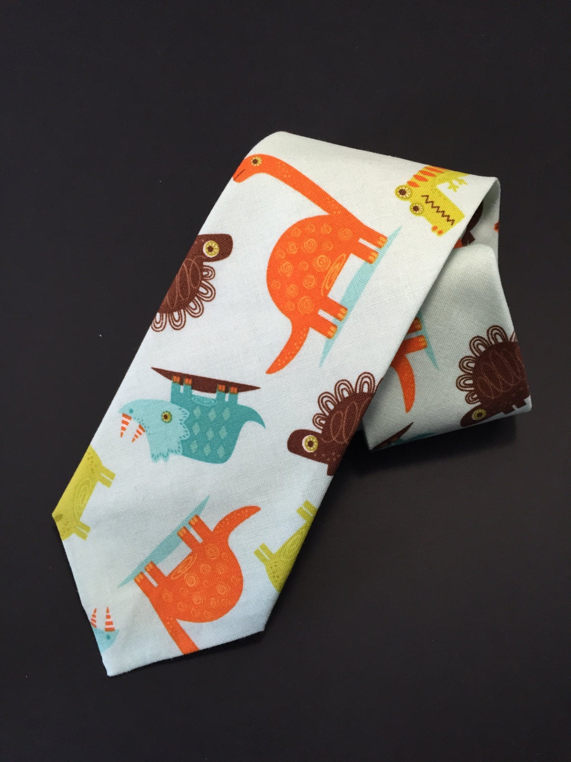 dinosaur with tie
