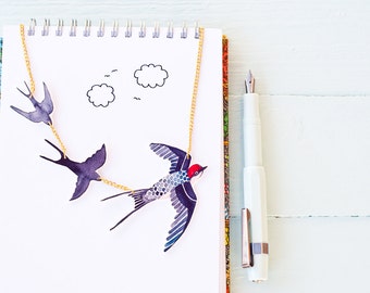 Flying swallows statement necklace