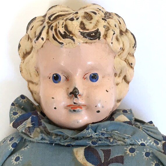 Antique Minerva tin head doll metal head doll blonde hair on