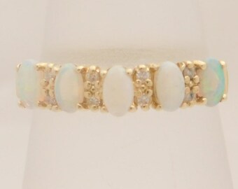 Ladies Oval Cut Opal & Round Cut Diamond Band 14K