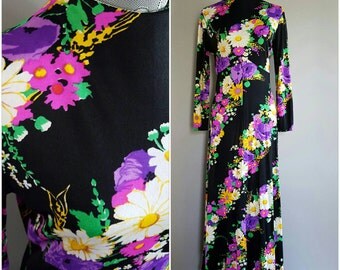 1970's vintage floral maxi dress. 70's boho black and neon dress. Women's vintage maxi dress with long sleeves and floral pattern. Size L.