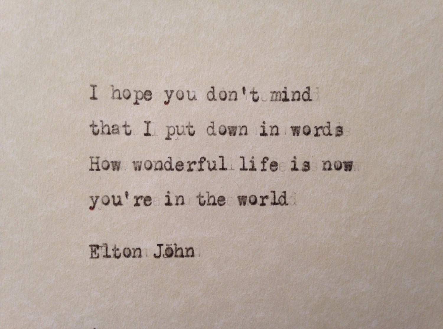 Elton John Your Song lyrics hand typed on antique typewriter