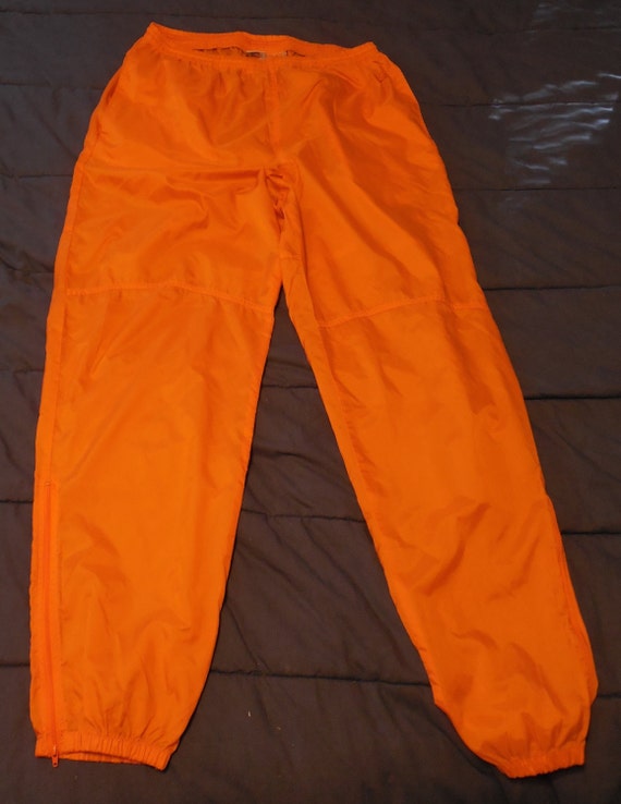 orange nike sweatpants mens