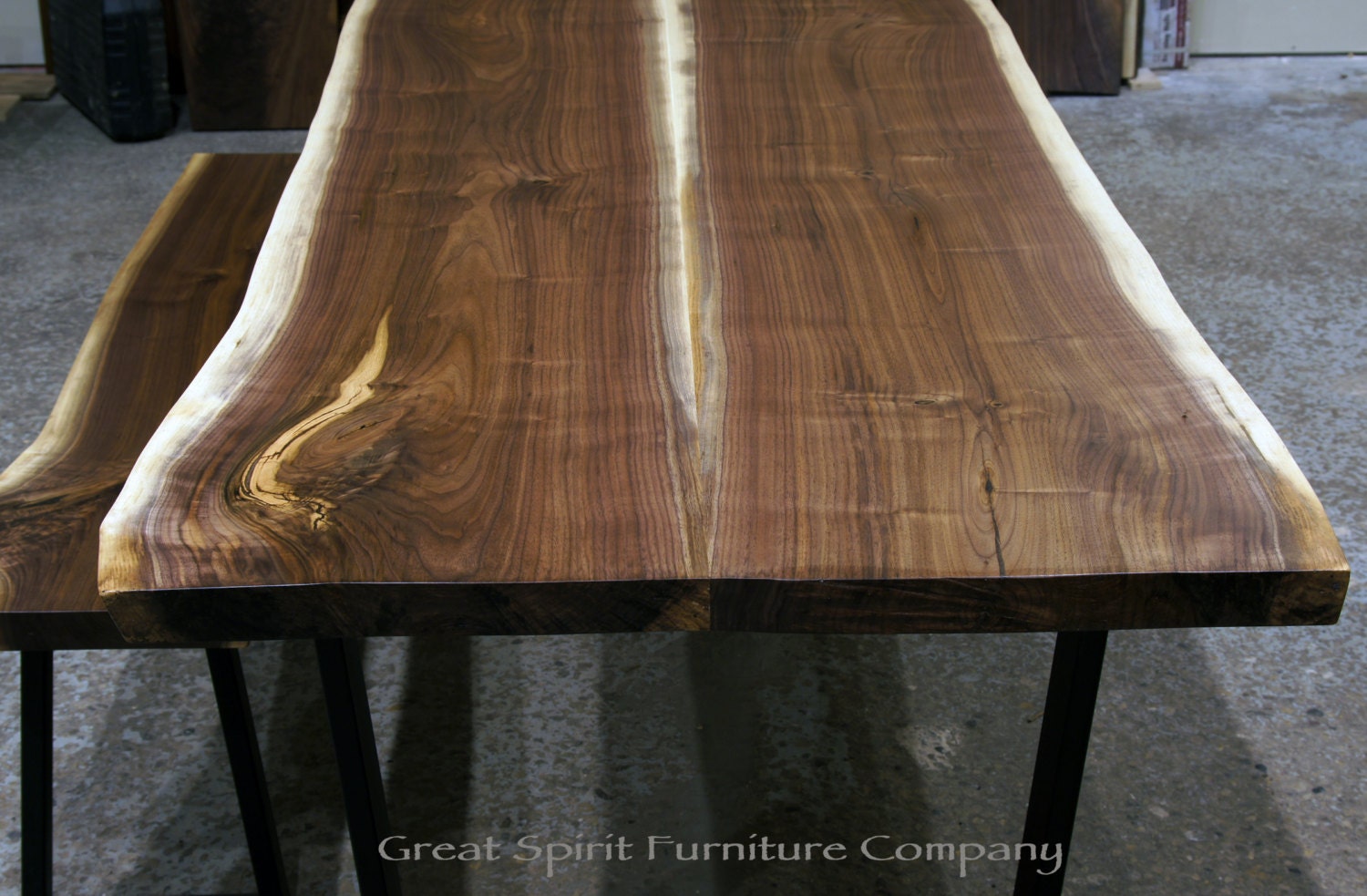 Slab dining table in rescued Black Walnut by GreatSpiritHardwoods