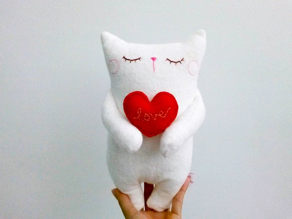 stuffed cat with heartbeat