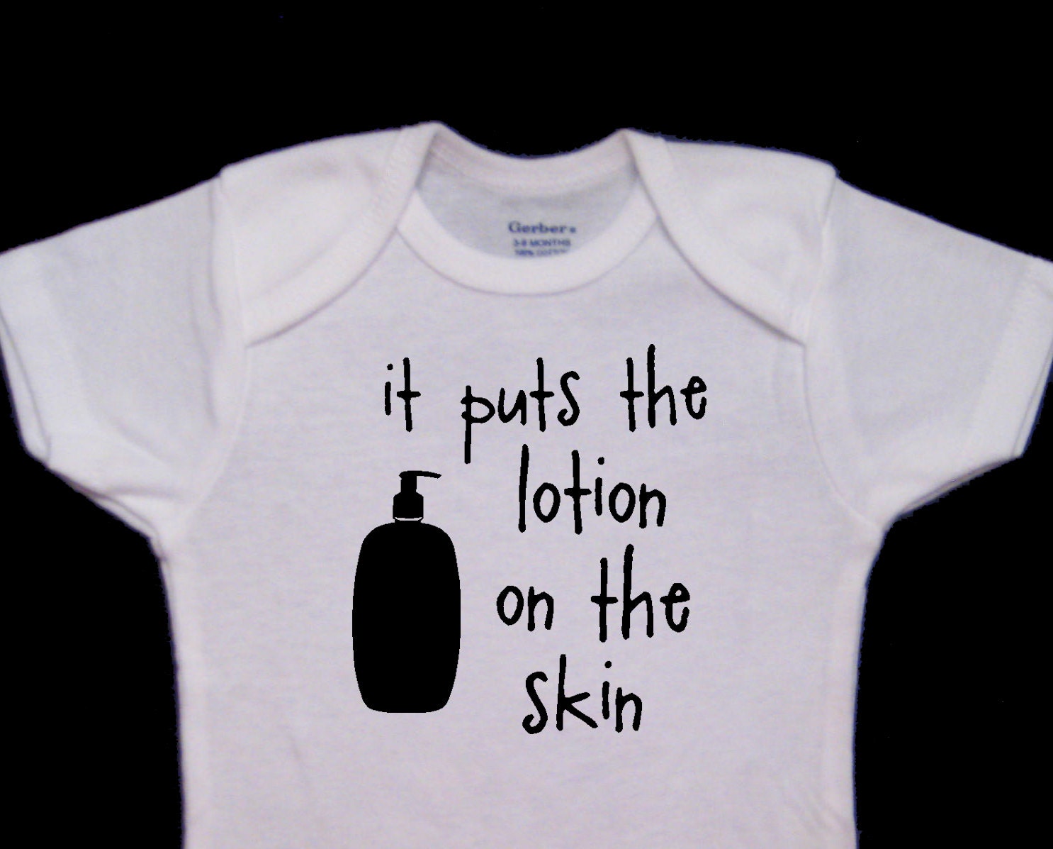 it puts the lotion on the skin shirt