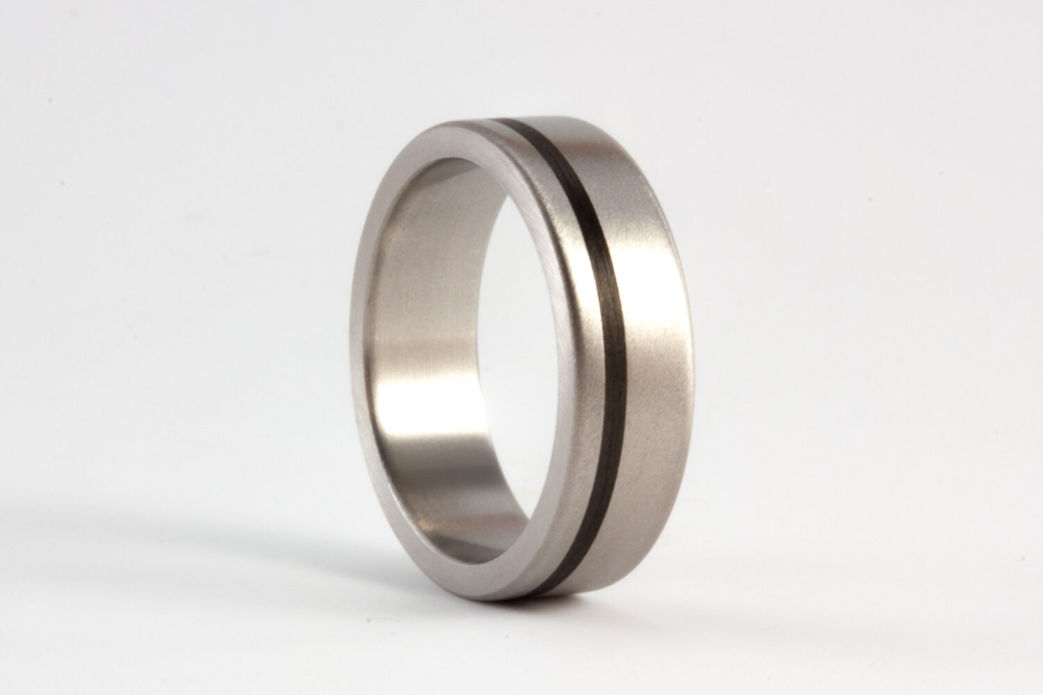 Men's carbon fiber & titanium ring. Unique matte wedding