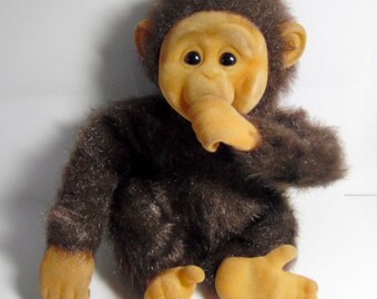 monkey sucking thumb toy