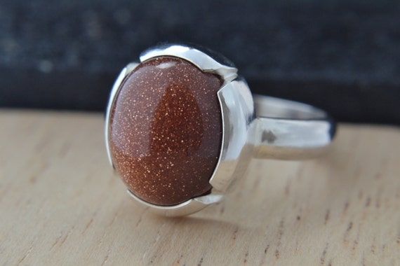 Oval Goldstone Cabochon Ring In Sterling Silver