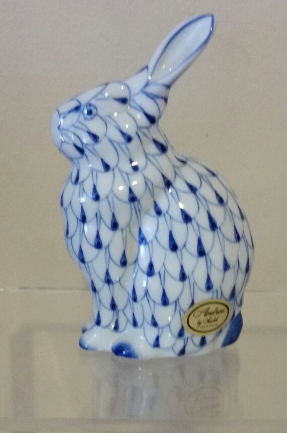 blue and white rabbit figurines