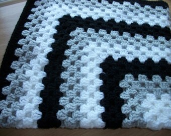 Hand crocheted baby blanket. Pale grey, white and black. Suitable for car seat, crib, pram or moses basket. Ideal just to wrap baby in.